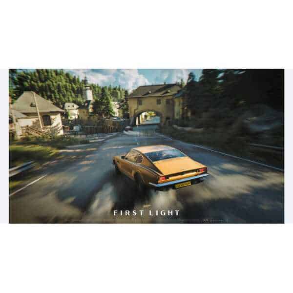 Classic Aston Martin speeding through a scenic village road.