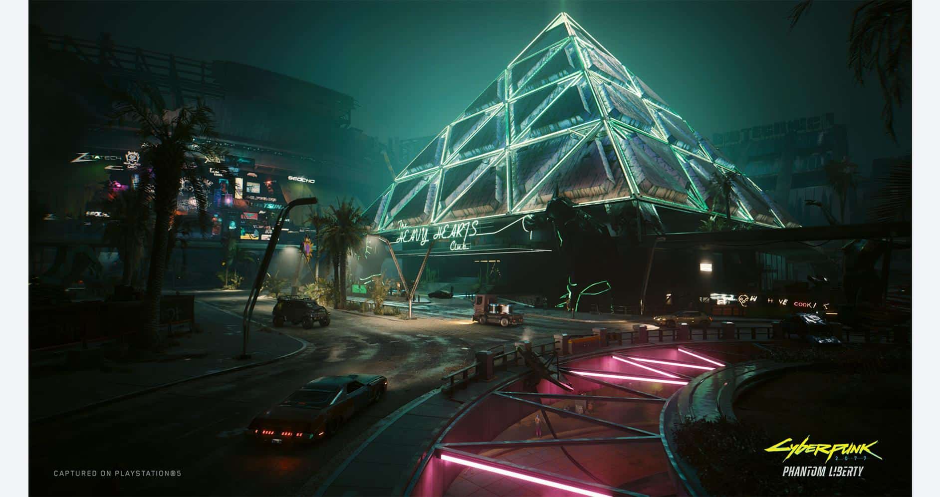 Futuristic neon-lit cityscape with a pyramid-shaped building at night.
