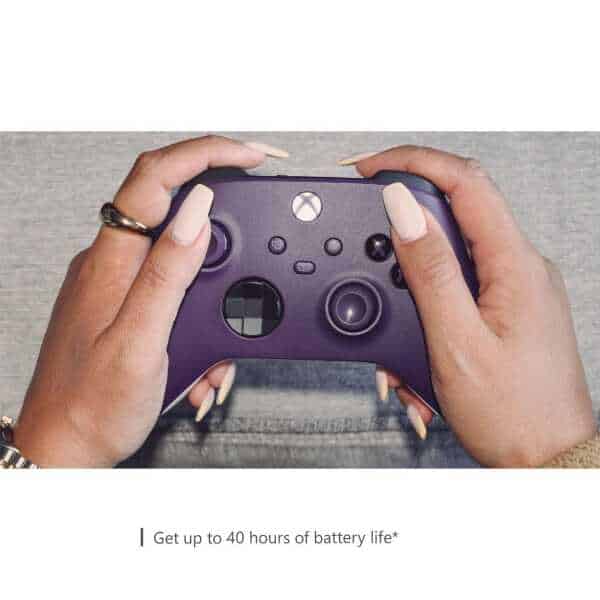 Close-up of a person holding an Astral Purple Xbox Series X wireless controller.