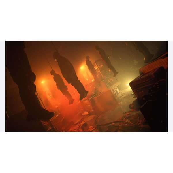 Firefighters fighting a large blaze in a smoky, hazardous environment.