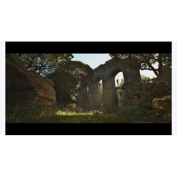 Historic Roman aqueduct ruins in a lush, green landscape.