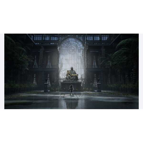 Indoor garden with lush plants and a central statue in a modern, glass-domed building.