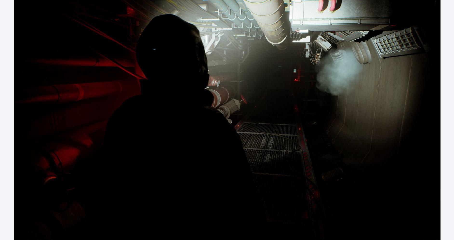 Person using gaming equipment in a dark, high-tech environment.