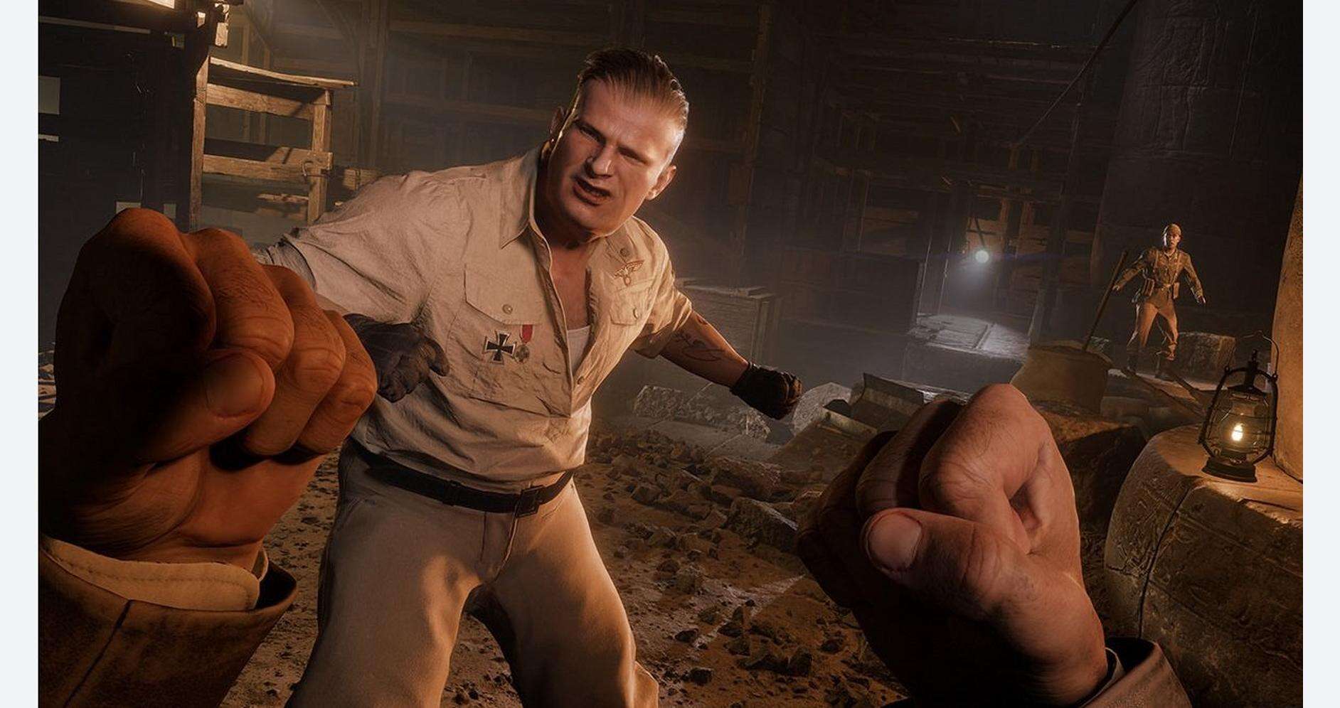 Indiana Jones in action with fists raised in a dark, adventurous setting.