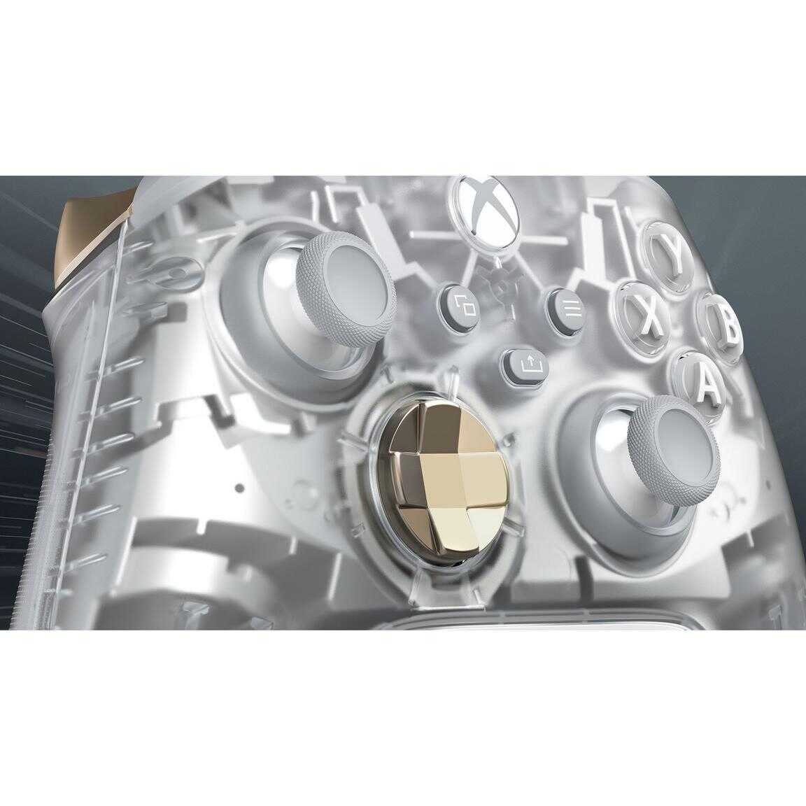 Close-up of Xbox Series X wireless controller with transparent design and metallic accents.