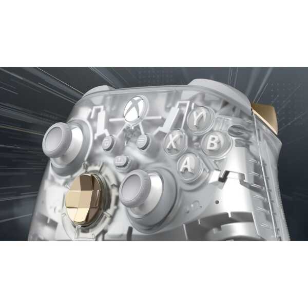 Transparent Xbox Series X wireless controller with gold accents and textured grips.