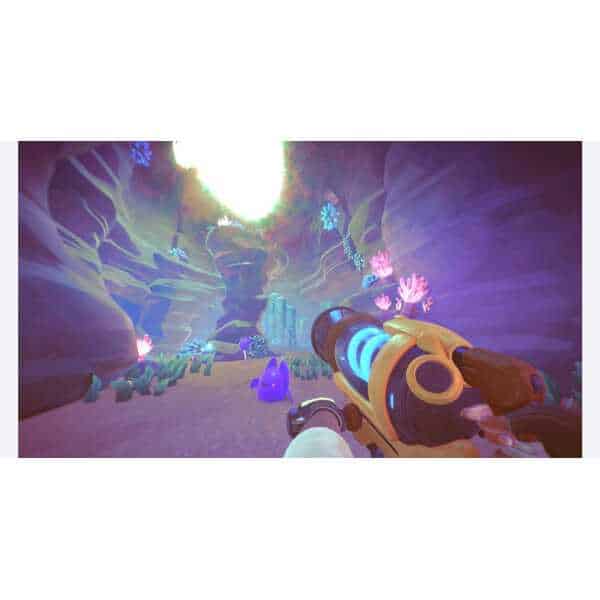 Gameplay scene from Slime Rancher 2 showing colorful slimes and vibrant environment.