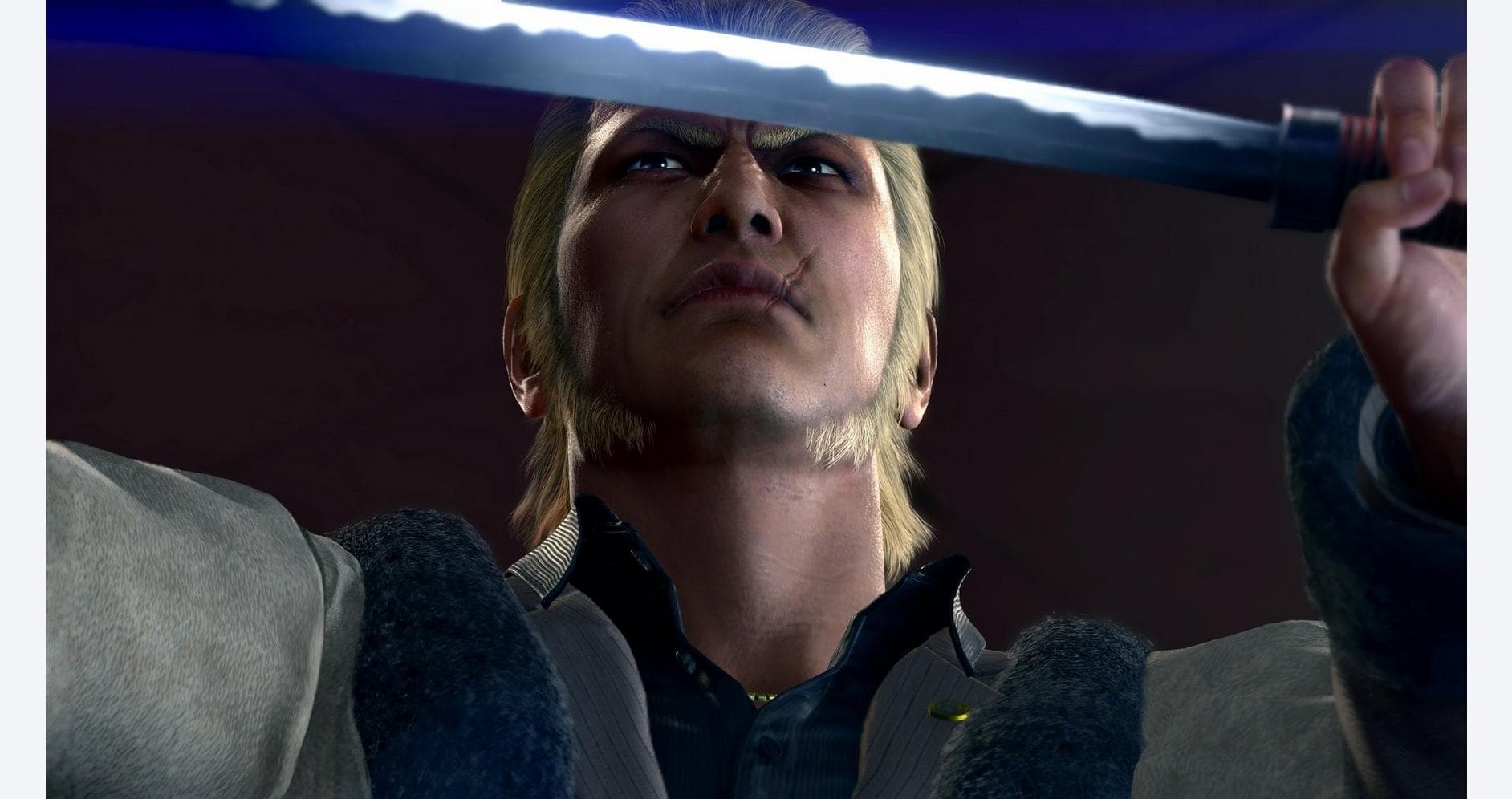 Close-up of a character from Yakuza Kiwami 2 holding a katana.