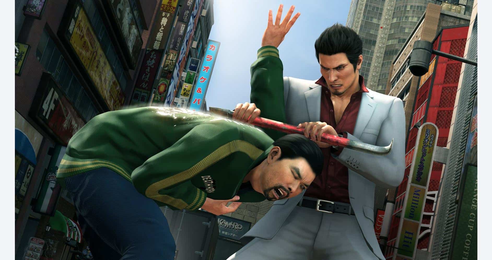 Intense fight scene from Yakuza Kiwami 2 in a busy city street.