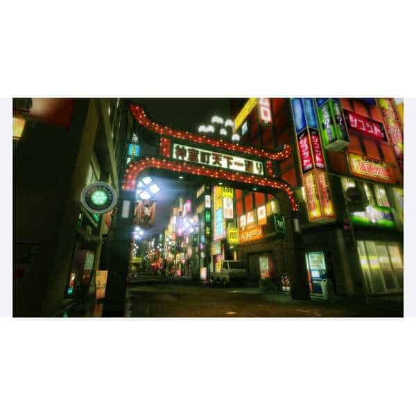 Bright neon signs illuminate a busy urban street scene in Tokyo, Japan.