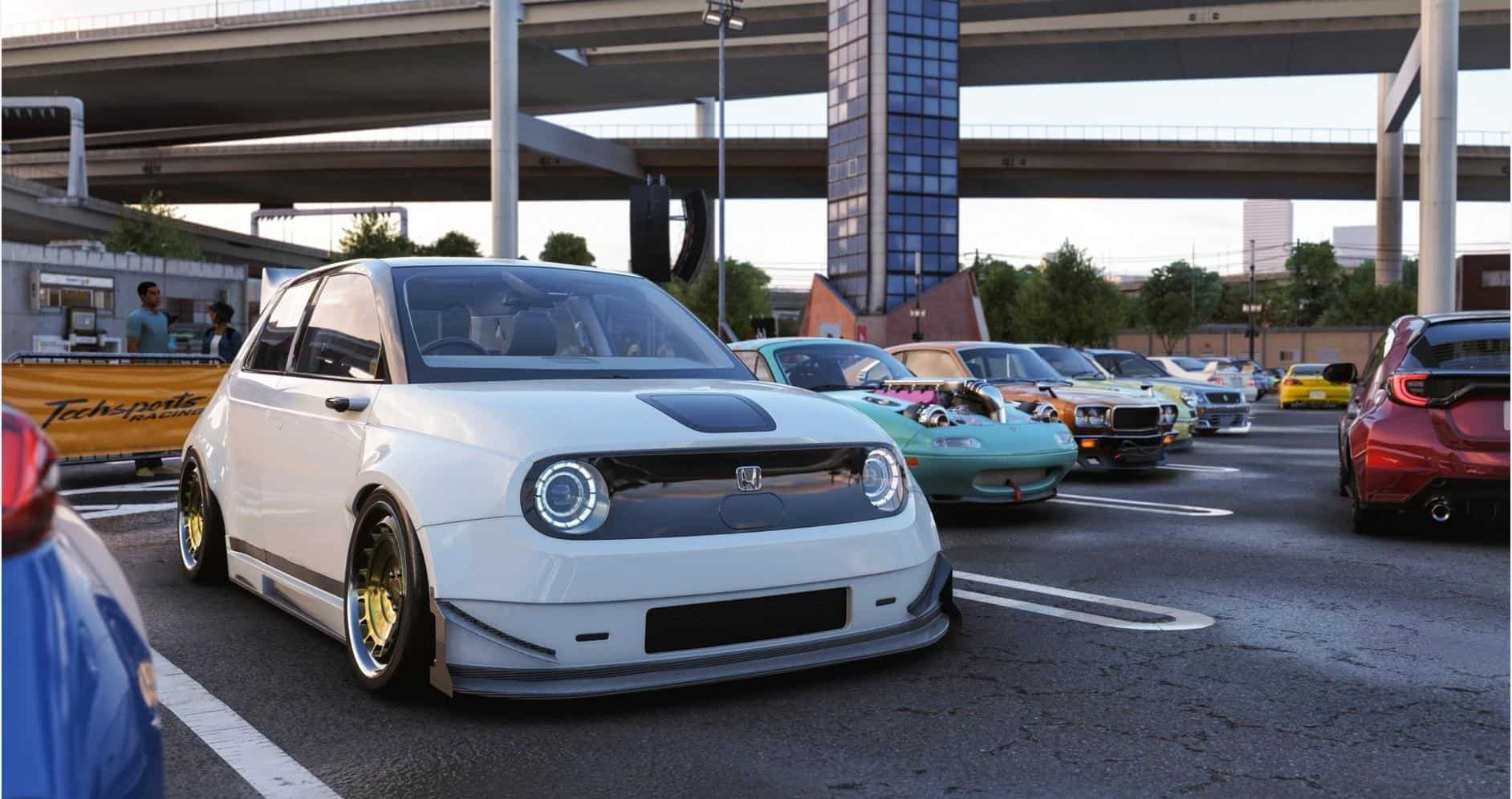 Car parked at a racing event in Forza Horizon 6, showcasing customized vehicles and vibrant atmosphe.