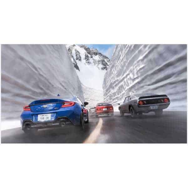 Forza Horizon 6 racing cars on icy mountain road in snow-covered landscape.