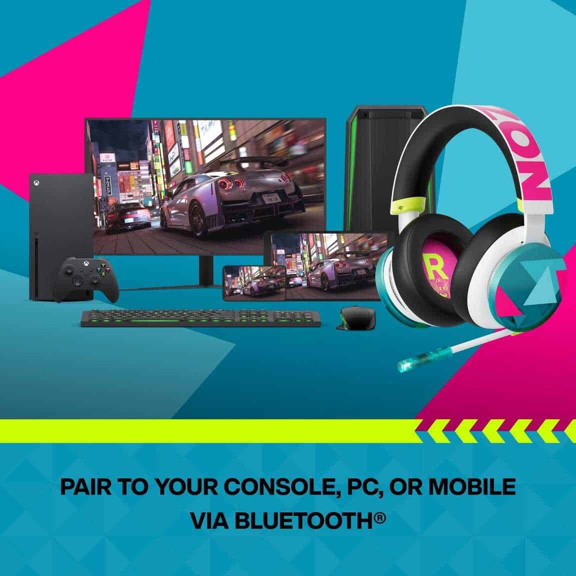Gaming setup with Xbox Series X, monitor, keyboard, and gaming headset.