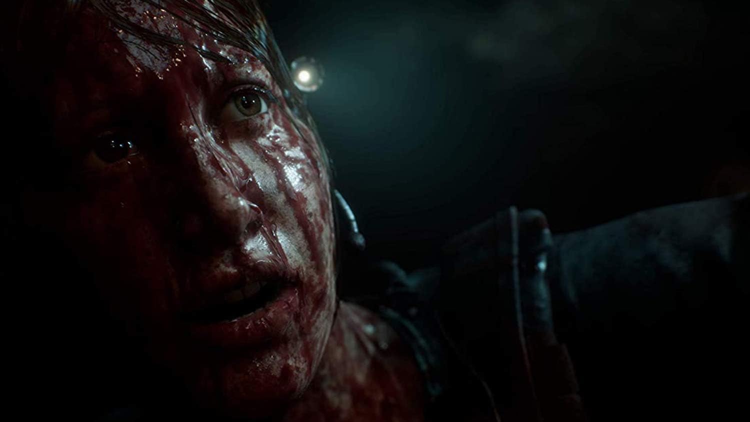 Intense close-up of a bloodied horror game character with a dark background.