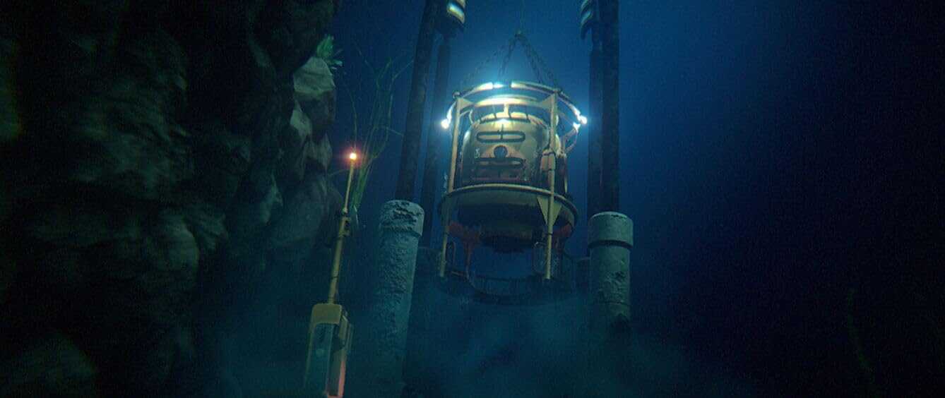 Deep-sea exploration vehicle descending into the ocean depths.
