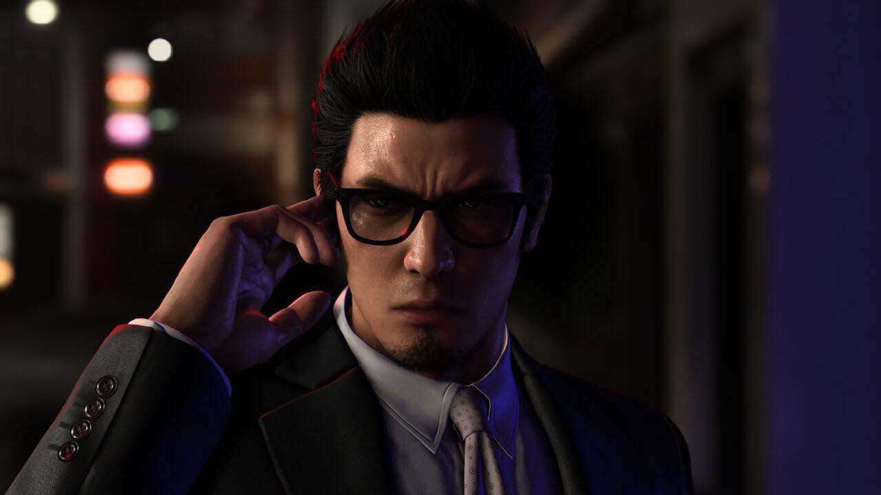 High-tech man in glasses adjusting earpiece in a dark, futuristic setting.