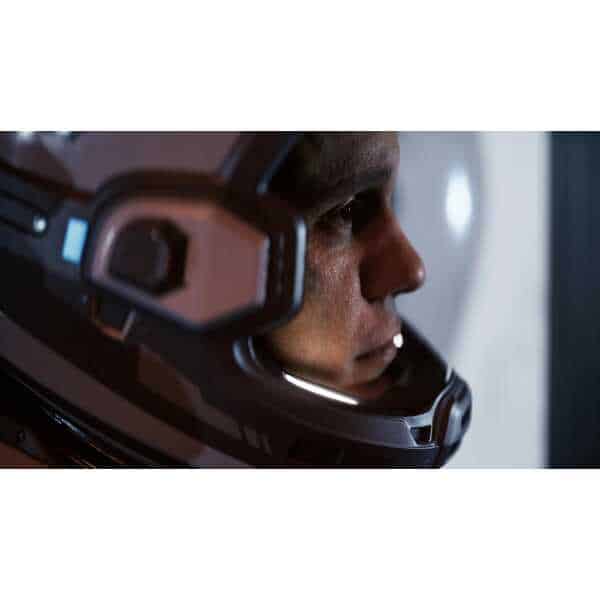 Close-up of a man wearing a gaming headset for immersive experience.