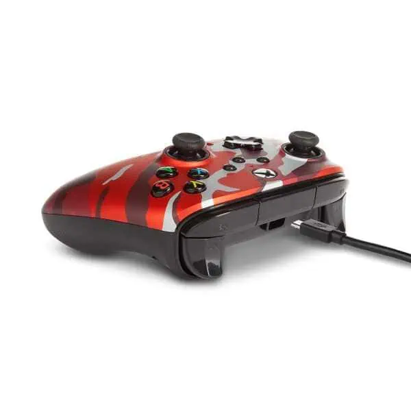 Wired Xbox Series X controller with red camouflage design.