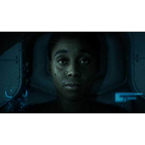 Close-up of a woman with water droplets on her face in a sci-fi setting.