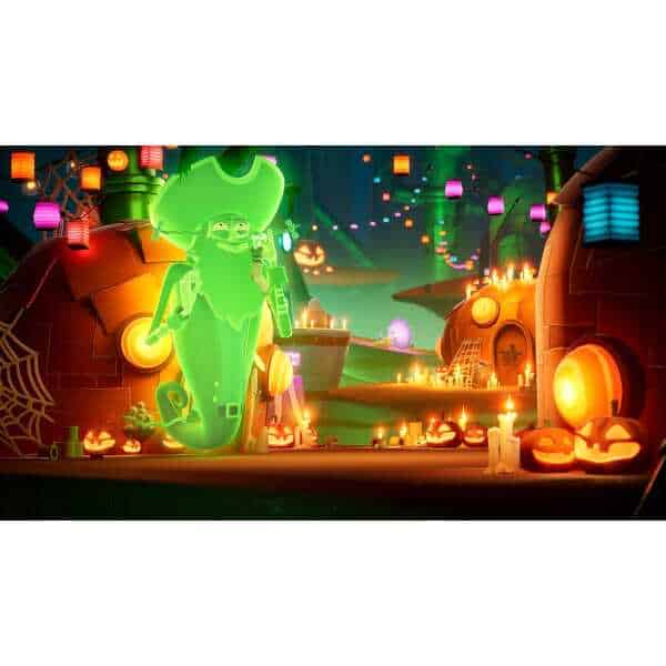 Halloween-themed game scene with ghost and pumpkins at night.