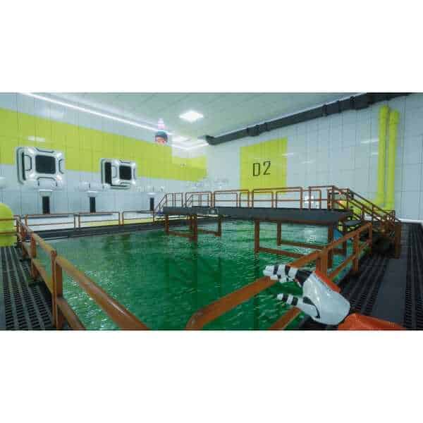 Indoor water testing pool at Gameware facility with safety barriers and advanced equipment.