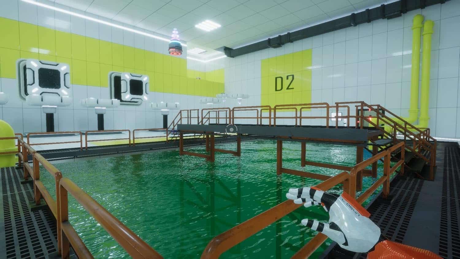 Indoor water testing pool at Gameware facility with safety barriers and advanced equipment.