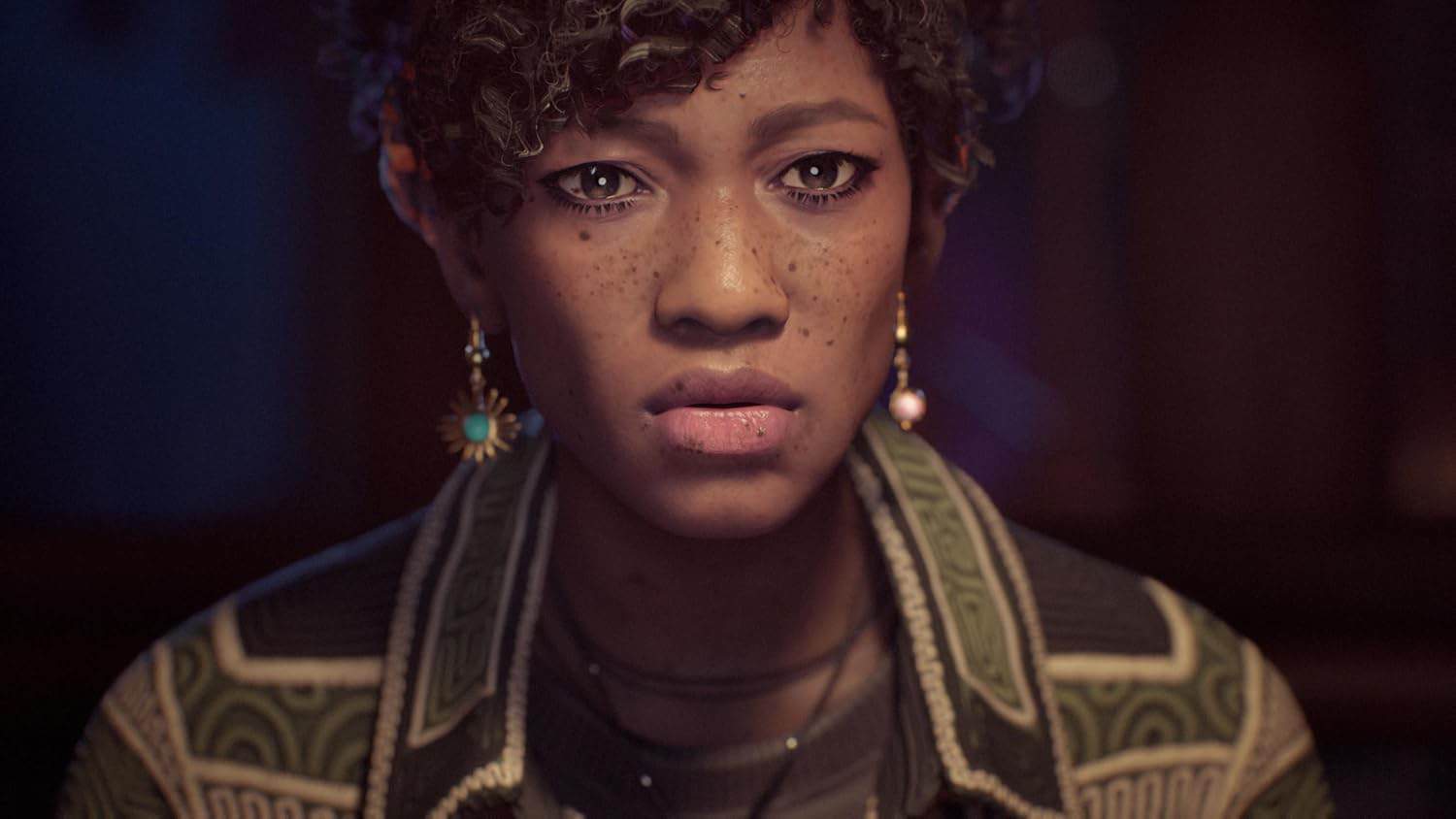 A young woman with natural curly hair and expressive eyes, wearing stylish clothing and jewelry, in.