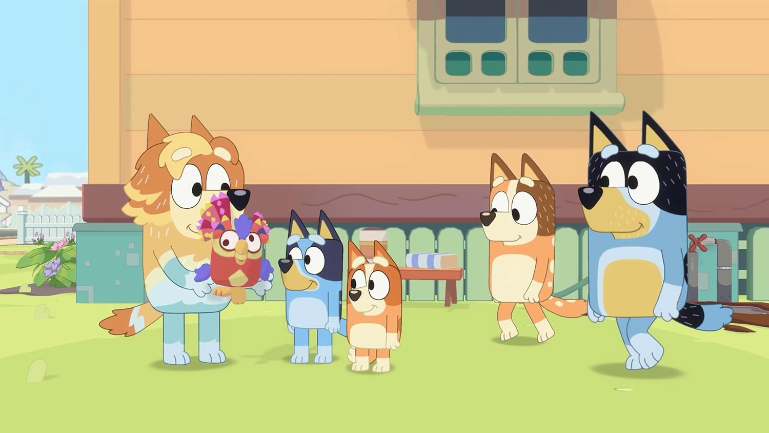 Cartoon animal family with puppies and kittens in a cozy home setting.