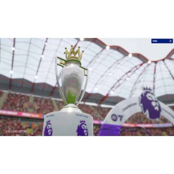 Football Manager 2026 trophy at a stadium with fans and Premier League branding.