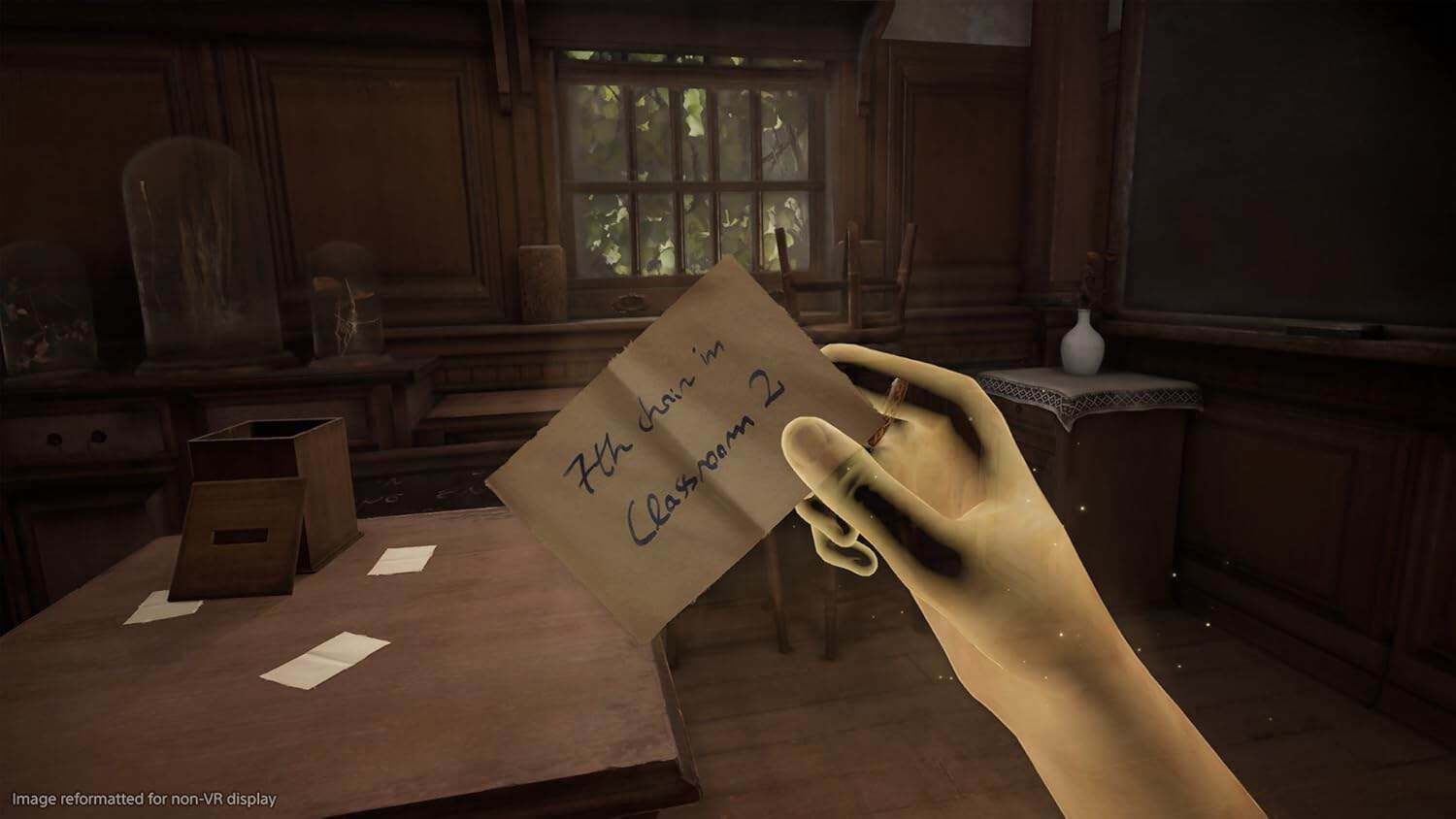 Vintage classroom scene with wooden desks and a hand holding a note.