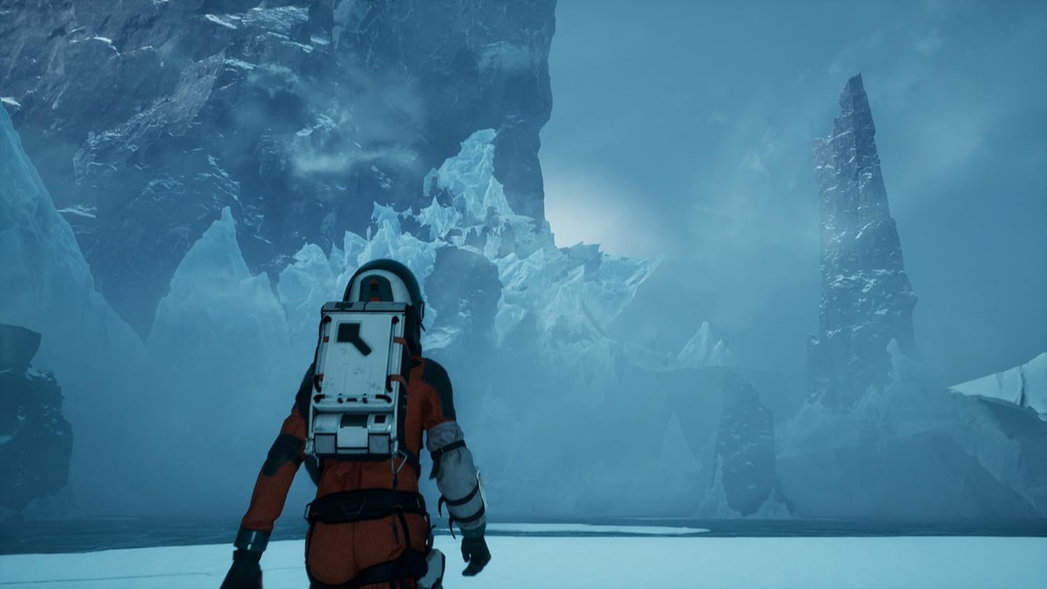 Explorer in icy Arctic landscape with glaciers and icebergs.
