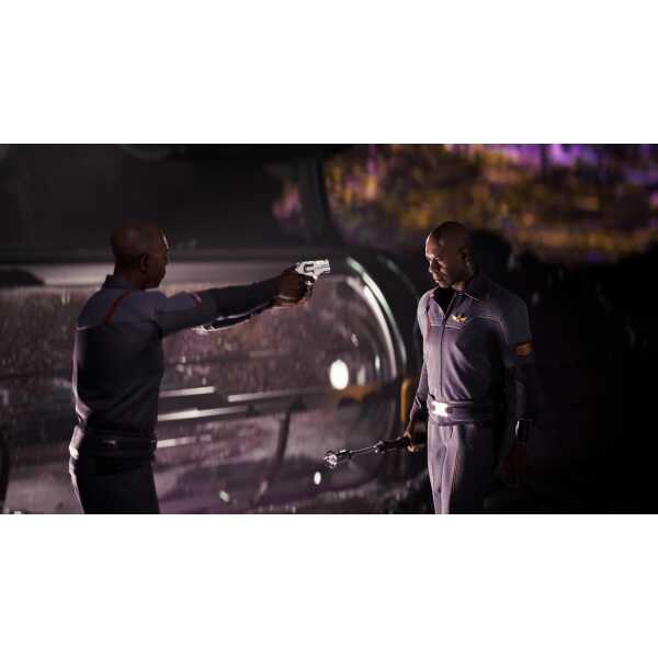Two men in dark uniforms with a gun and a baton in a nighttime setting.