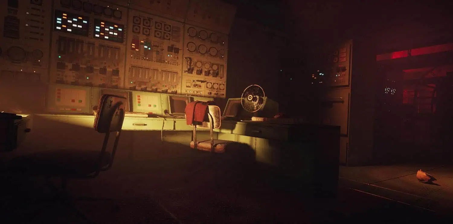 Control room with vintage gaming equipment and monitors.
