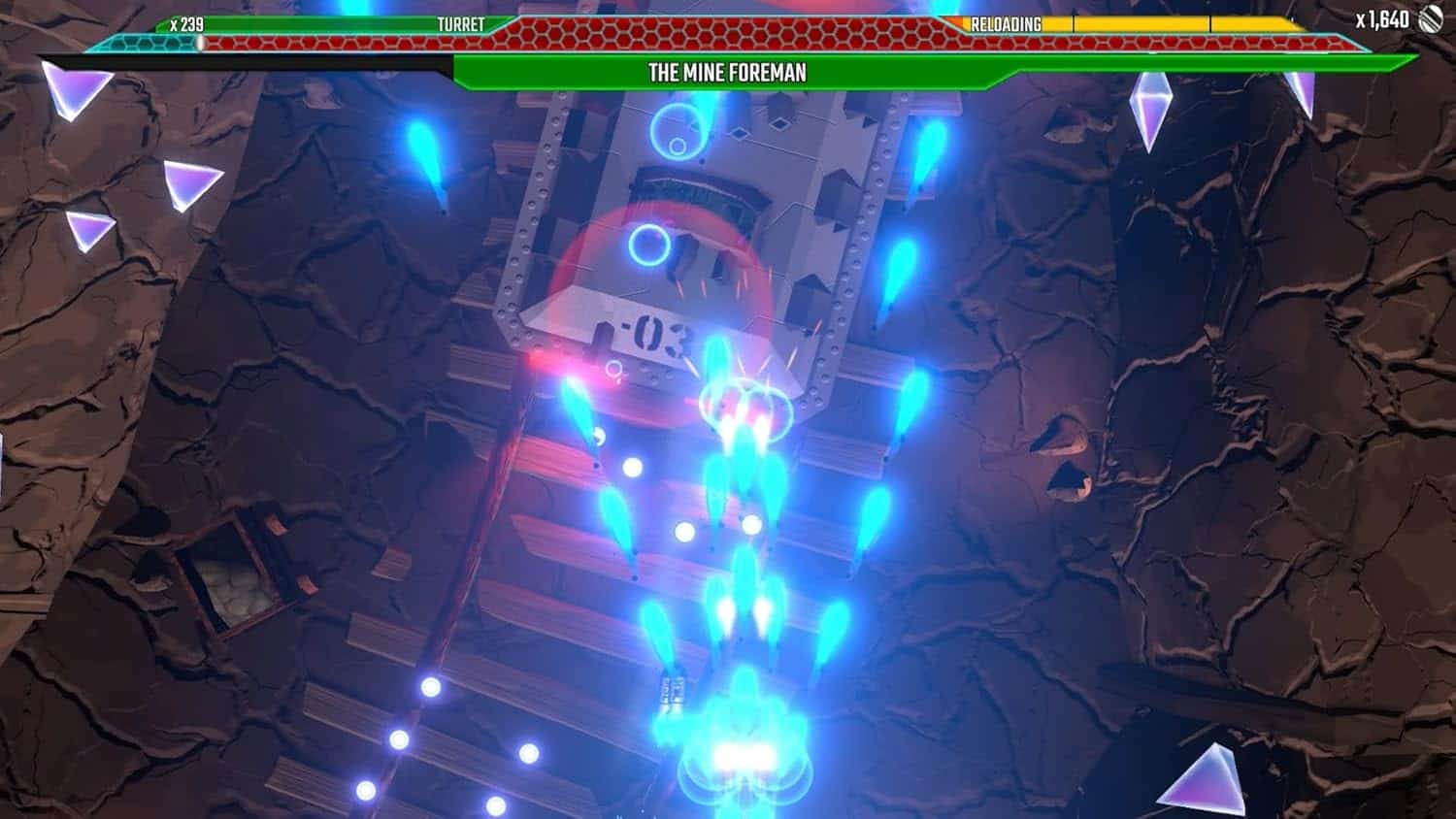 Classic arcade game screenshot featuring the Mine Foreman with vibrant neon graphics.