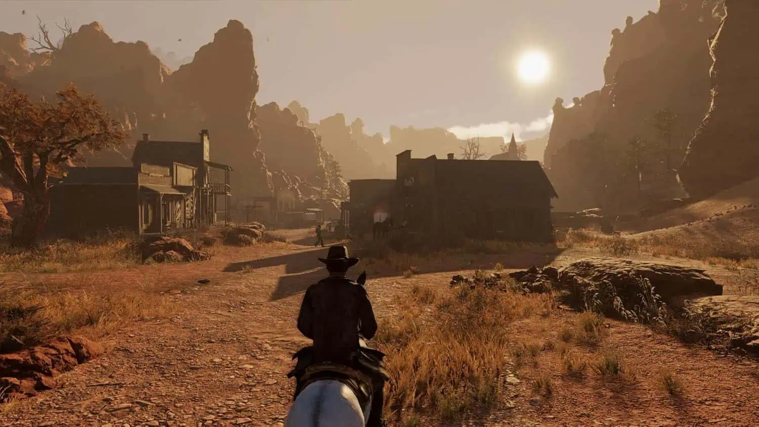 Wild West Legacy Ultimate Edition game scene with cowboy in a desert town.