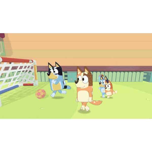 Cartoon dogs playing soccer on a grassy field with a goal and ball.