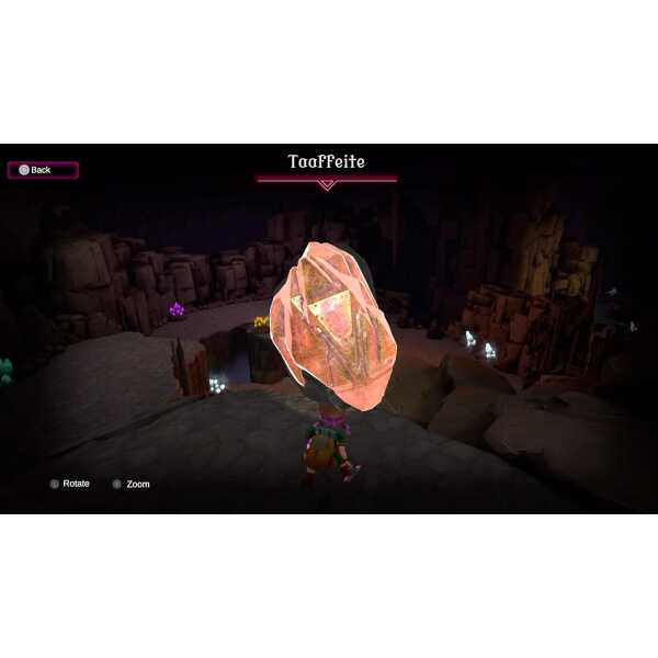 Glowing pink crystal in a dark fantasy game scene.