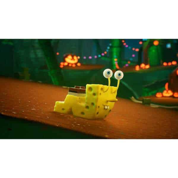 SpongeBob figurine with googly eyes on a Halloween-themed background.