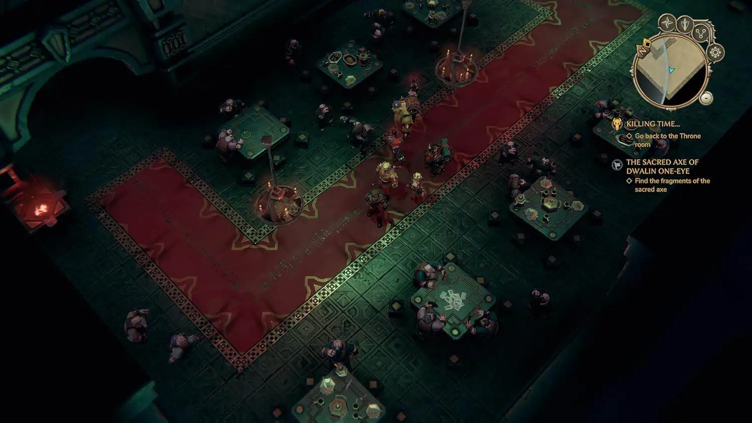 Top-down view of an elaborate board game setup with tokens and cards.
