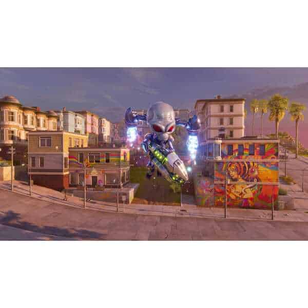 Large alien skull sculpture with electric effects in a colorful urban setting.