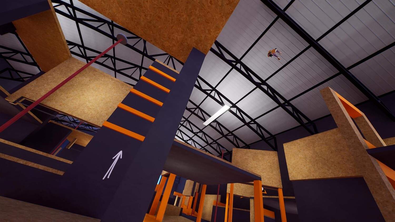 Indoor parkour training facility with climbing walls and obstacle courses.