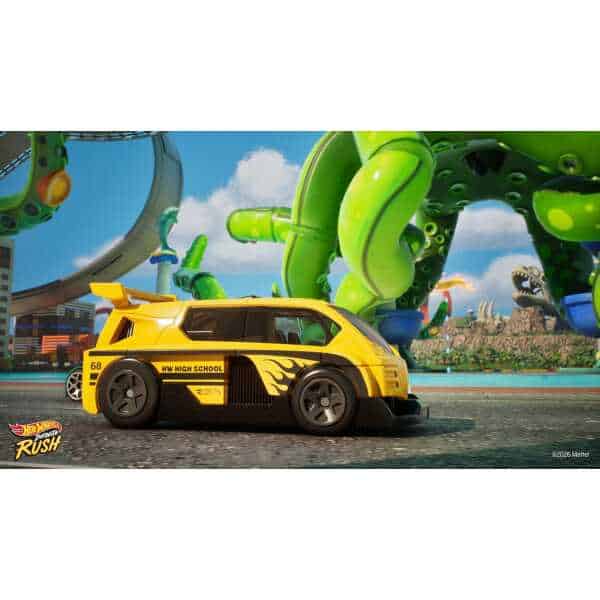 Yellow Hot Wheels car with black stripes in front of colorful amusement park rides.