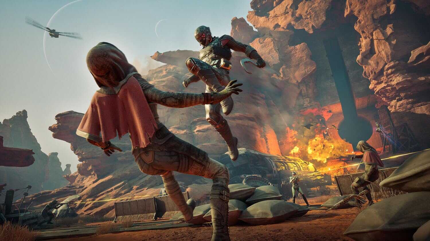 Futuristic battle scene from Dune: Awakening with characters fighting amidst explosions.