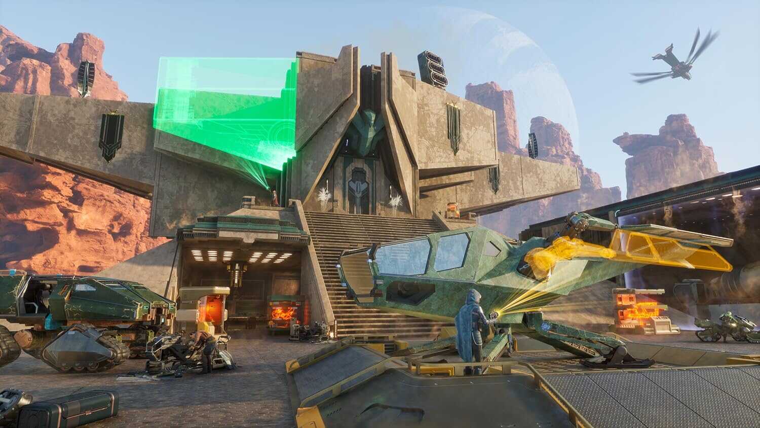 Futuristic military base from Dune: Awakening game with vehicles and aircraft.