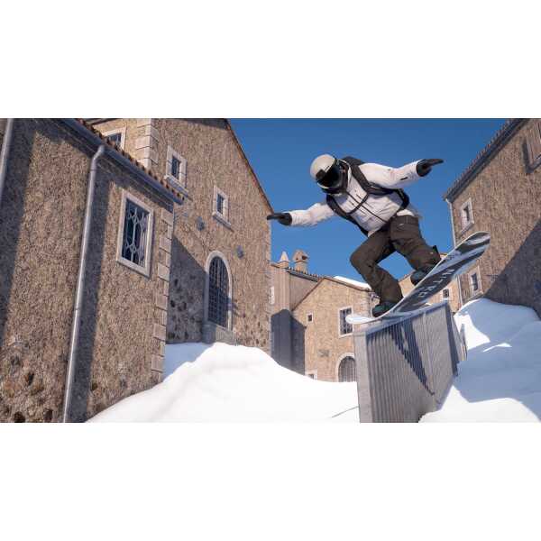 Action shot of a snowboarder performing a trick in snowy urban setting.
