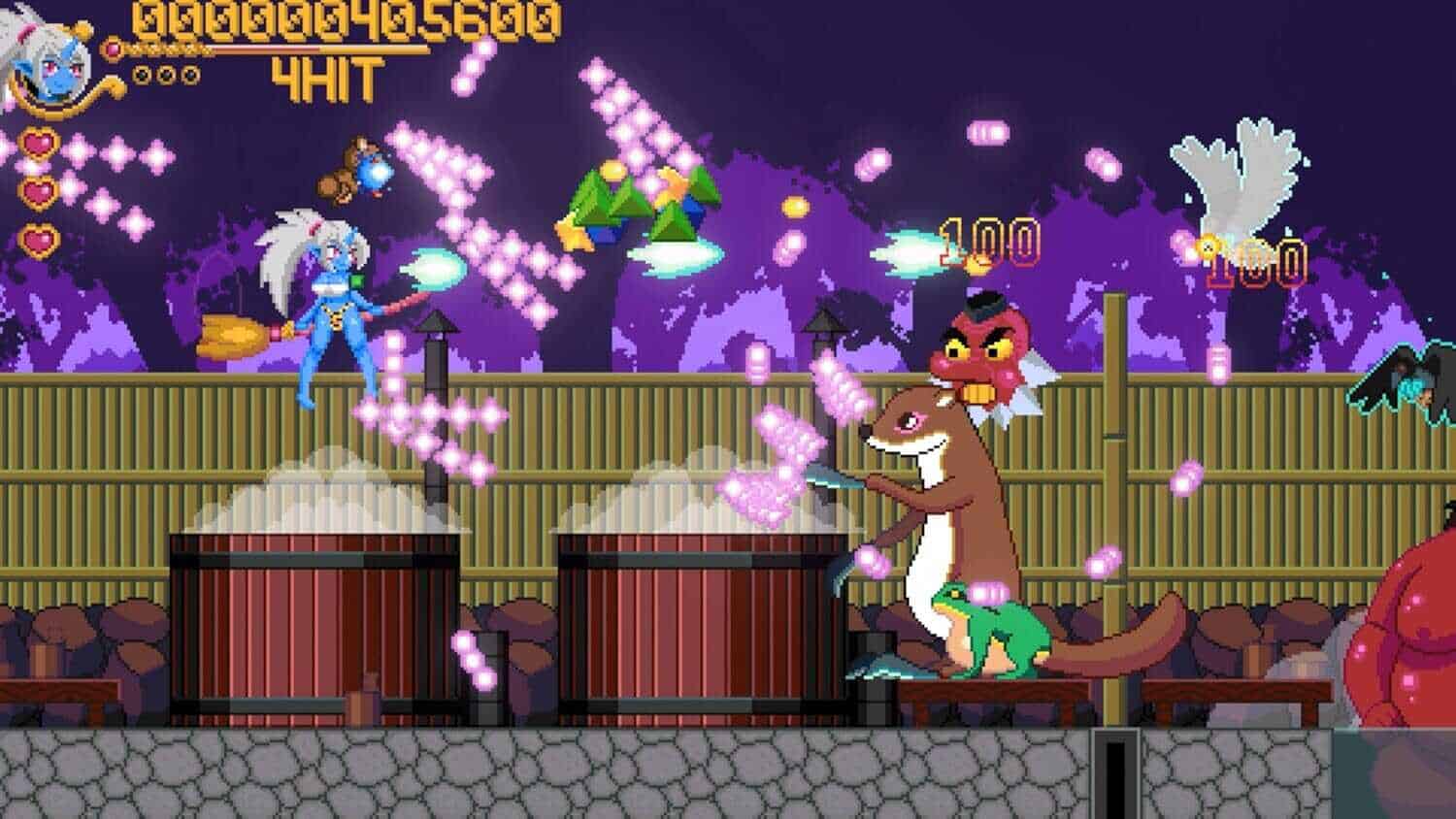 Colorful arcade game scene with characters and fireworks at night.