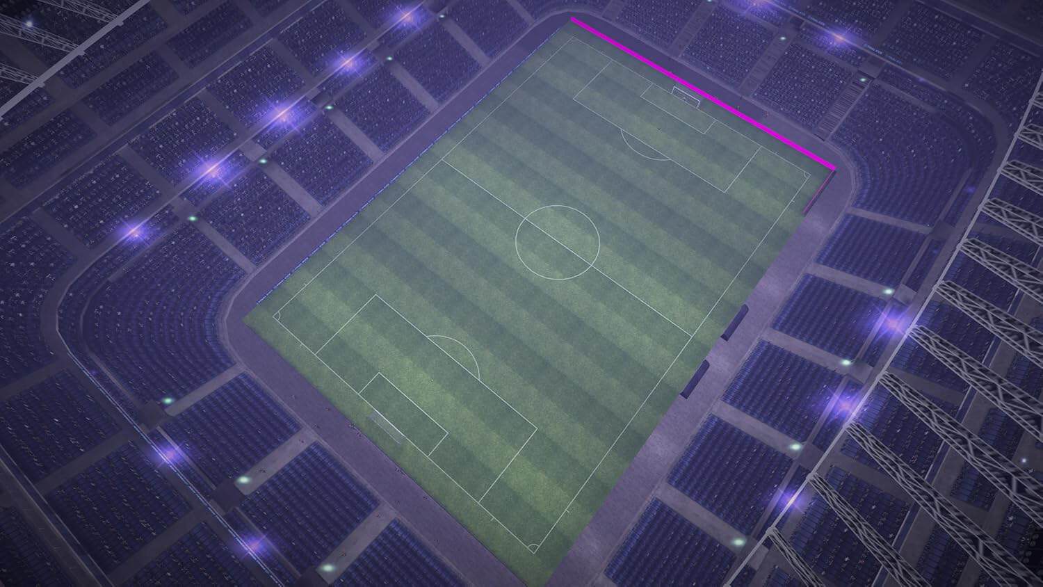 Soccer stadium illuminated at night with vibrant lighting and seating for fans.