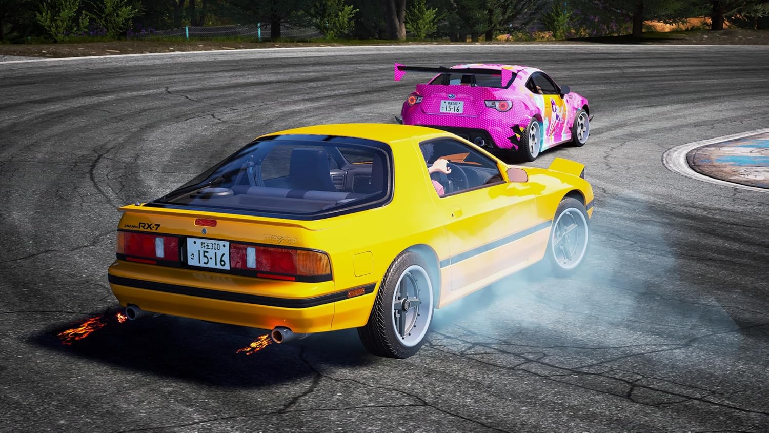Two colorful racing cars on a track, yellow and pink, in a competitive race setting.