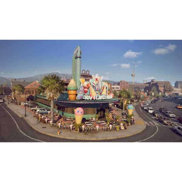 Bus Bound Deluxe Edition game cover with colorful ice cream and carousel design.