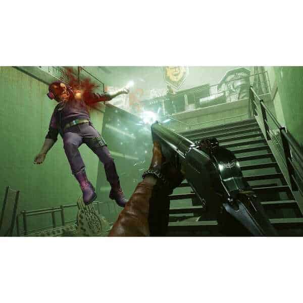 Player shooting at enemy character in a green-lit gaming environment.